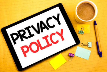 Privacy policy written on a tablet to show the Graphic Electric Inc privacy policy.